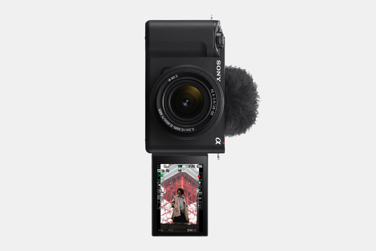 Imagine cu o cameră ZV-E1 cu ecranul LCD deschis, cu o imagine cu un bărbat, ilustrând afișarea informațiilor pe verticală